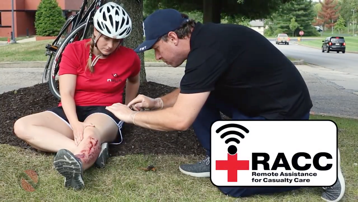 EMT assisting injured individual using Neya's RACC software